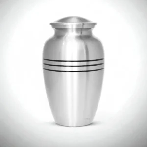 Top-down view of a Lineage Lumina silver cremation urn, showing the lid and smooth, polished finish.