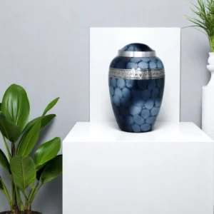 Elegant blue marbled urn for ashes with silver trim