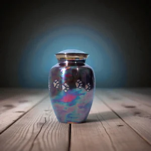 Brass cremation urn with paw prints and crimson reflections