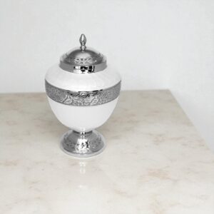 White brass cremation urn with silver engraved lid and decorative band