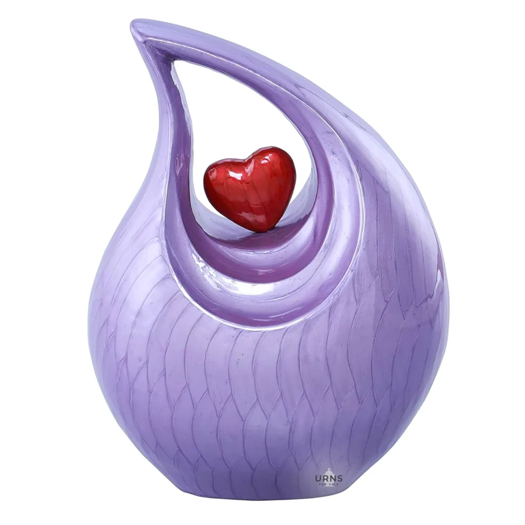 Elegant purple heart cremation urn with red heart centerpiece for ashes
