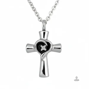 HDR enhanced image of a stainless steel cross urn necklace, featuring a heart swirl design, black inlay, and a central crystal gem, for ashes.
