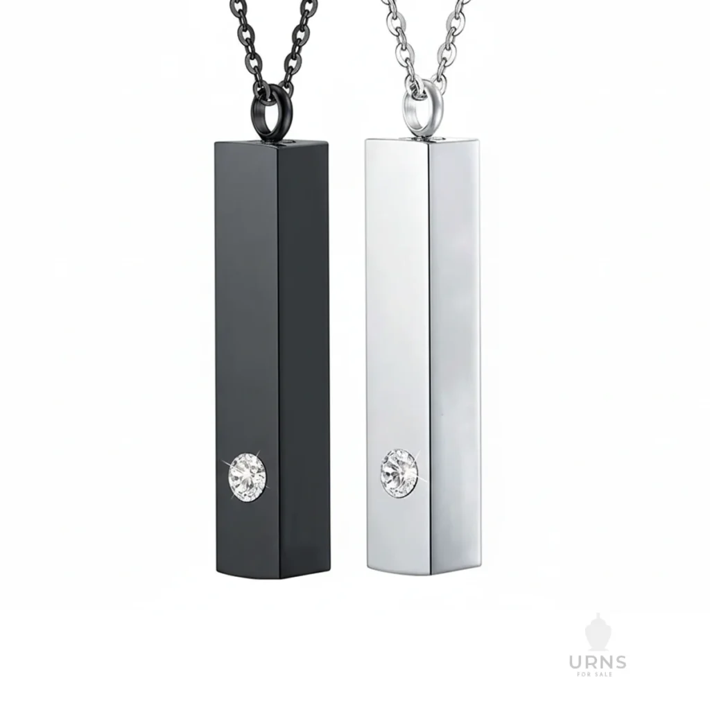 A polished silver Minimalist Bar Urn Necklace for ashes, featuring a subtle clear crystal accent, on a white background.