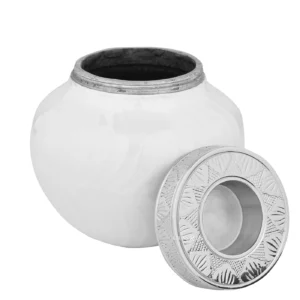 Pure Serenity White Infant Urn with its candle-holder lid resting beside the opening.
