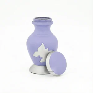 Aria Lavender Keepsake Urn with the lid removed, showing the small, empty internal chamber for holding token amounts of ashes.
