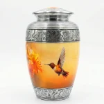 Adult Cremation Urn for Human Ashes - Hummingbird and Flower Design - Large Handcrafted Funeral Vessel with Engraved Silver Bands - Warm Orange & Yellow Finish