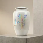 The Ethereal Flight Hummingbird Urn – Adult Cremation Urn for Human Ashes – Iridescent Floral Design – Pearlescent White Finish with Silver Trim