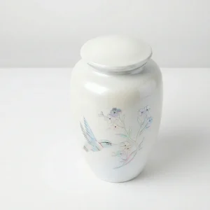 Top angle view of the Ethereal Flight white cremation urn, focusing on the smooth pearlescent threaded lid.