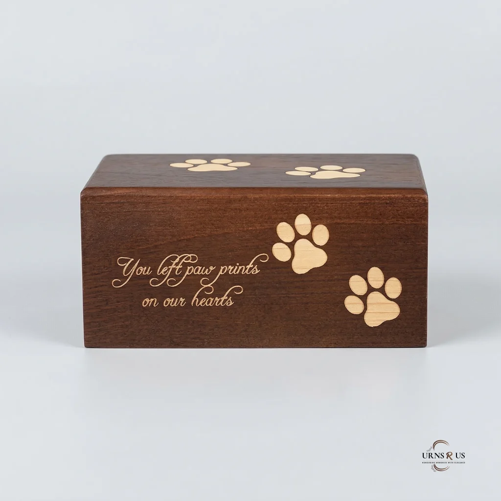 Wooden urn for pet ashes with paw print memorial design