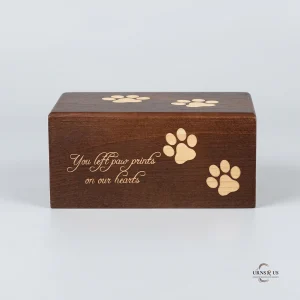 Wooden urn for pet ashes with paw print memorial design