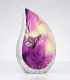 Elegant silver teardrop cremation urn featuring a vibrant purple floral and butterfly design for adult human ashes.