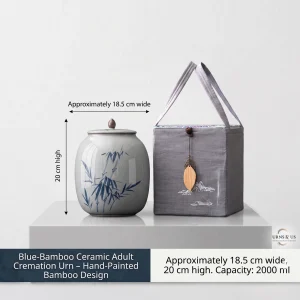 Studio photograph of a hand-painted blue and white ceramic urn with a detailed bamboo plant pattern. The urn is shown on a white pedestal with dimension arrows indicating it is approximately 18.5 cm wide and 20 cm high. Text panels specify a 2000ml capacity and the product name 'Bamboo plant urn'.