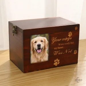 Dark stained wooden pet cremation urn featuring a photo of a Golden Retriever