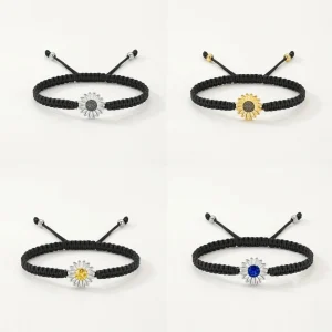 Adjustable black braided rope memorial bracelet featuring a silver sunflower cremation urn charm, displayed on a clean white background.