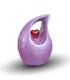 Purple teardrop keepsake urn for ashes featuring a suspended small red heart, isolated on a white background.