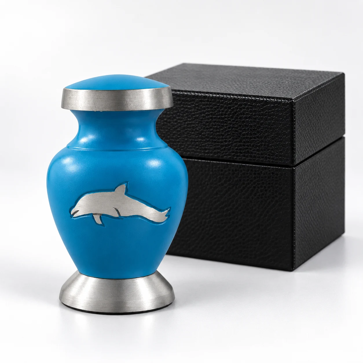 Aria's Dolphin's Grace blue keepsake urn with black presentation box