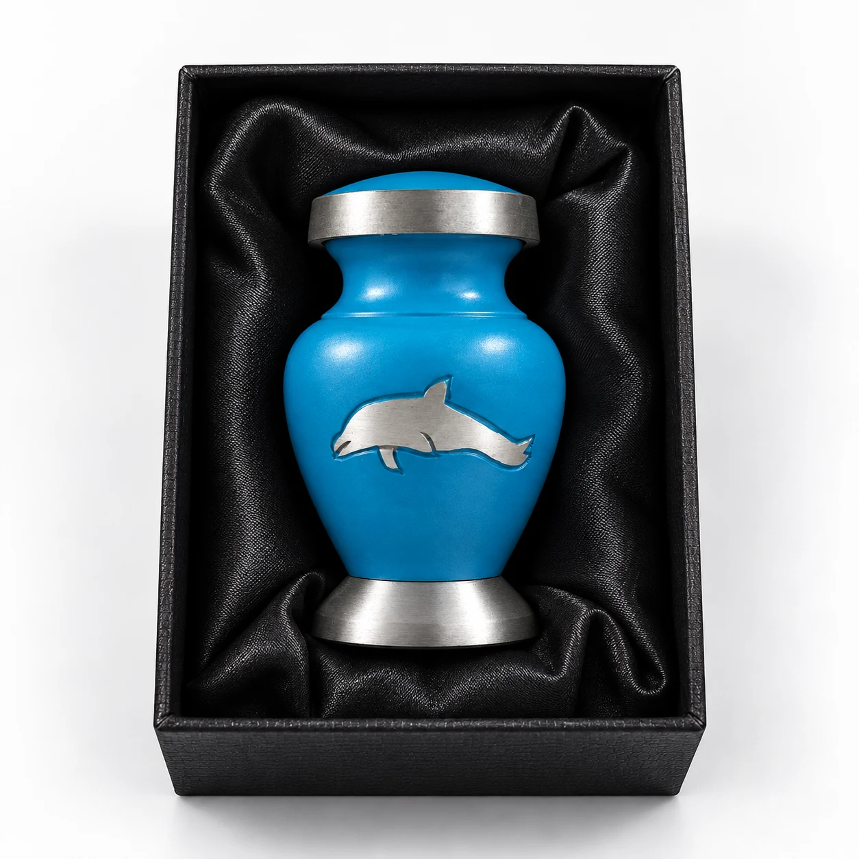 Dolphin keepsake urn for ashes inside black presentation box