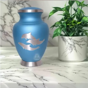 Dolphin cremation urn close-up, silver dolphin design