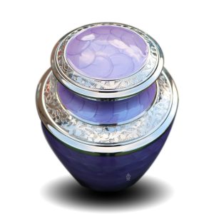 Lavender cremation urn with intricate silver detailing symbolizing eternal embrace