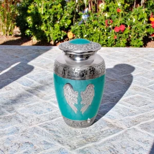 Green funeral urn with angel wing design – metal ashes container for loved ones