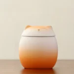 Orange White Ceramic Cat Shaped Pet Urn with Gold Accents – Memorial Ashes Keepsake