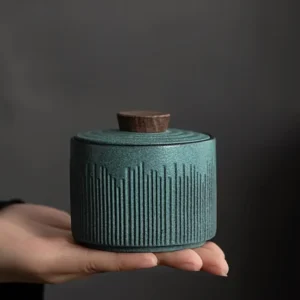 Small Pet Ashes Urn - Blue Ceramic Keepsake showing in hand