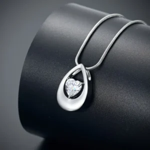 showcasing teardrop memorial heart cremaiton necklace